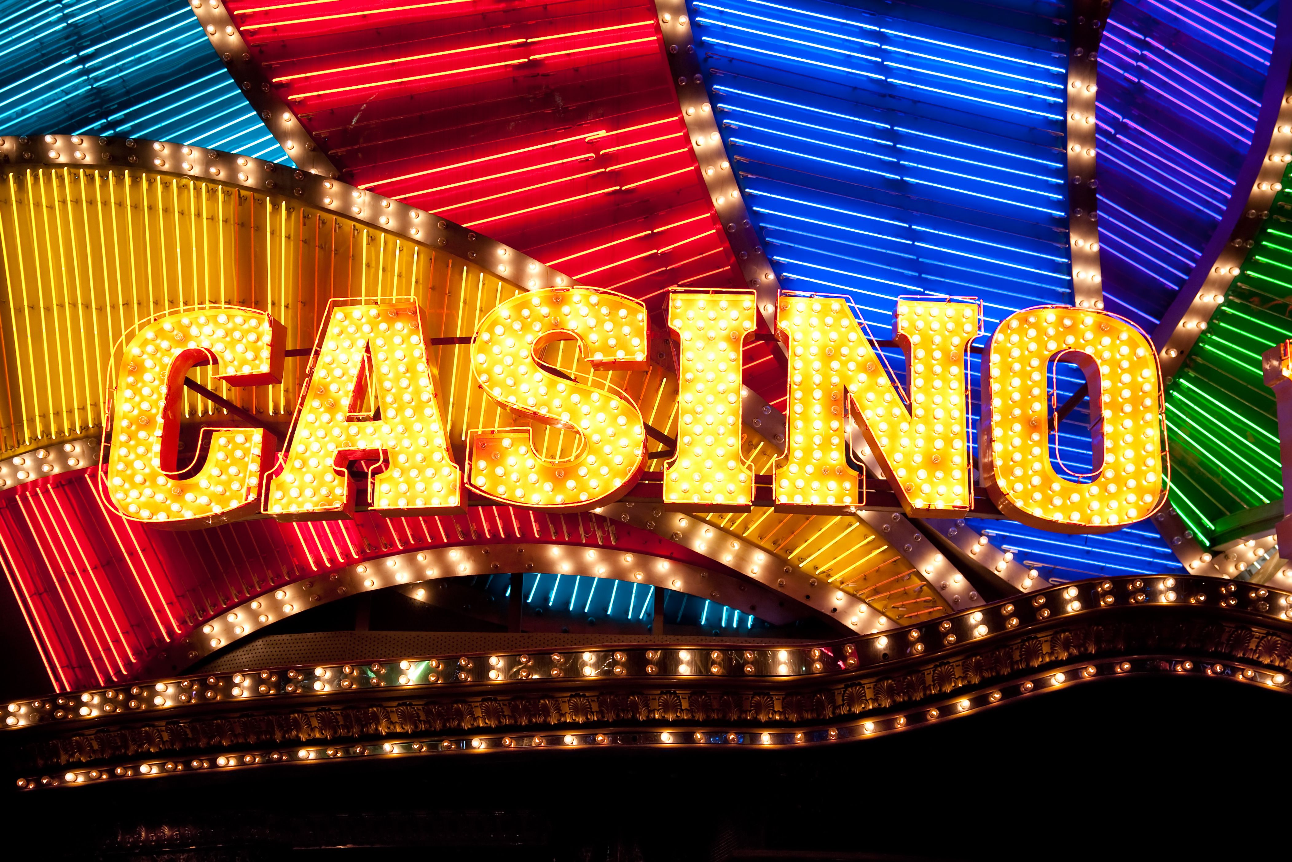 A neon-themed graphic with the Slots of Vegas logo and text 'No Deposit Bonus Codes'.